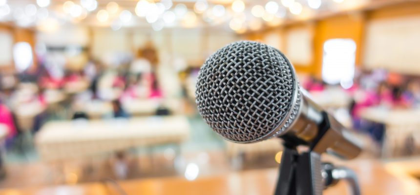 Black microphone in conference room