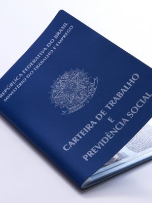 Brazilian work document and social security document (carteira de trabalho) on white background