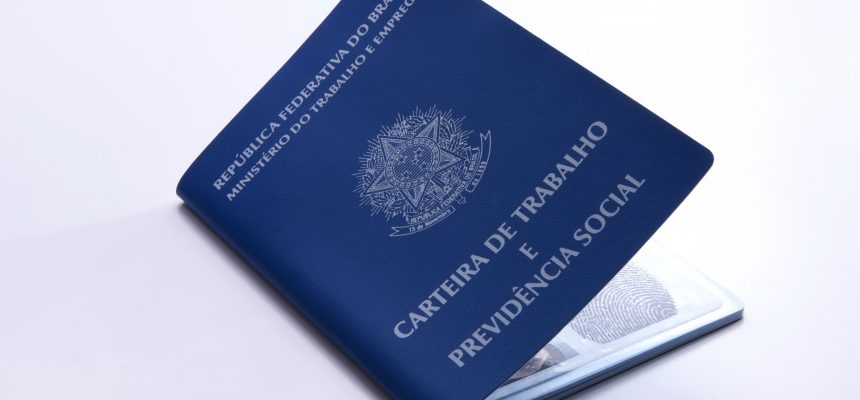 Brazilian work document and social security document (carteira de trabalho) on white background